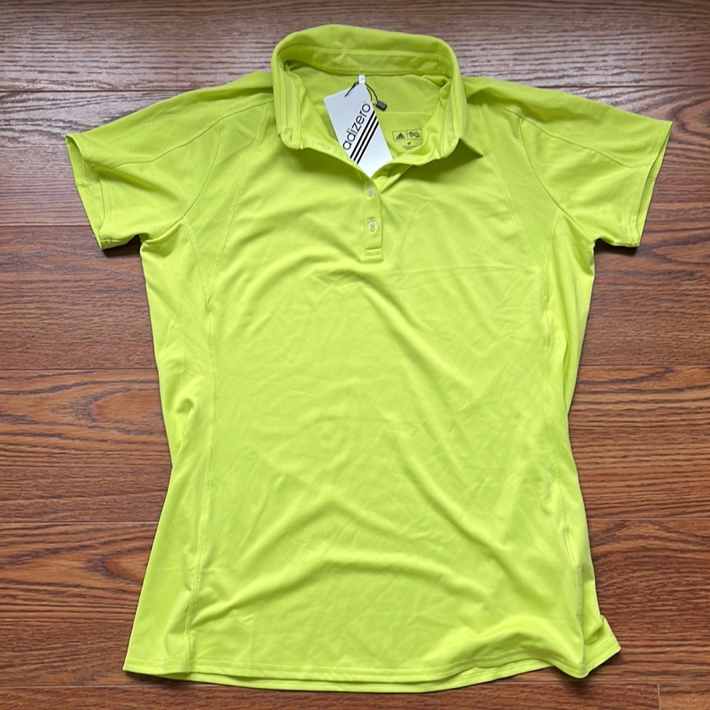Adidas women’s golfing shirt. New with tags!